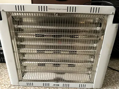 6 candle room heater ( Arrow brand) - 70 aed