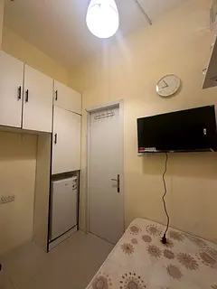 Available new single partition with smart tv and fridge in Academic city (Out Source)