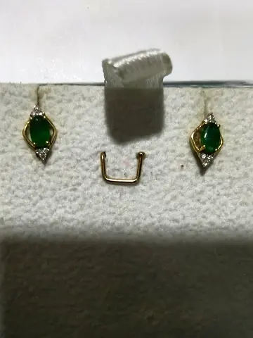 Gold earrings with emerald and small diamonds - gently used