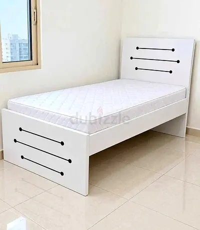 Single white wooden bed frame with mattress - modern design