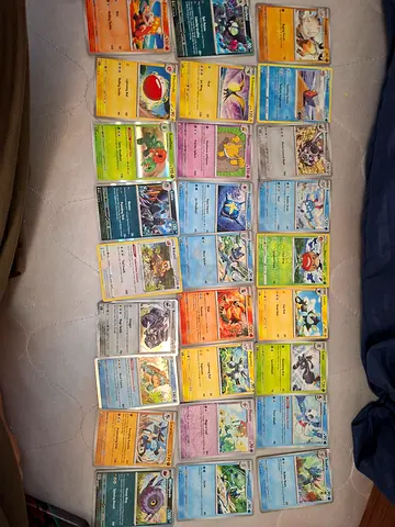 Various pokemon cards some are sleeved aprox 90-100 cards