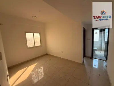 One-bedroom apartment with a living room for annual rent in Al Naeemiyah 2 – Ajman | New building and free maintenance