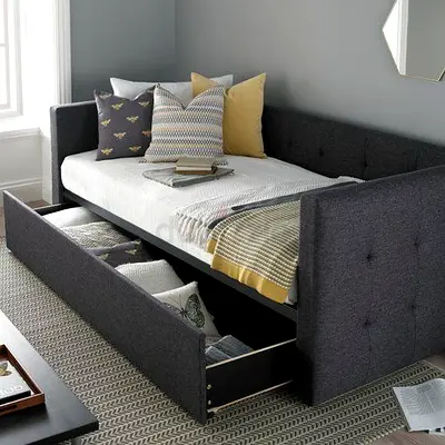Dark grey upholstered daybed with under-bed storage drawer