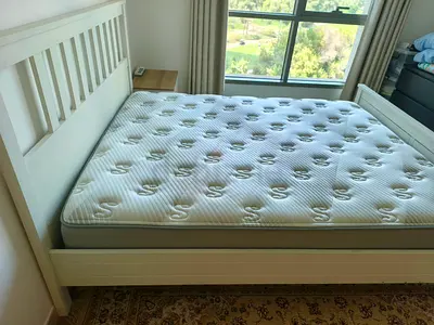Queen size mattress with wooden bed frame - good condition