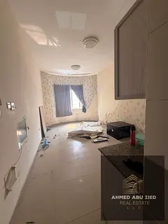 Studio For Annual Rent in Al Jurf 2 - Spacious Layout Studio - Open Kitchen - 1 Bath - Central AC - 