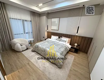Villa for sale on Sheikh Mohammed bin Zayed Road, on a main street near the park. Two floors and a rooftop, including registration and ownership fees