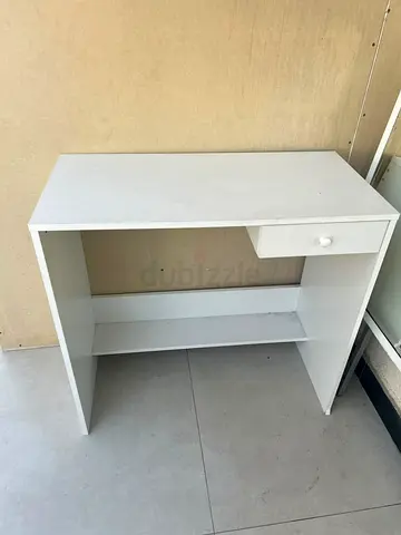 Compact white study desk with single drawer