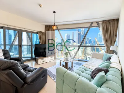 Furnished l 2-Bedroom + Maid’s Room