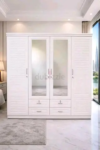 Brand new 4door wardrobe with mirror available