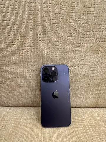 IPhone 14 Pro 128gb purple color cracked from the back battery health 75.