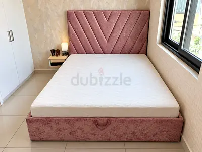Queen fabric upholstered bed frame with storage, pink