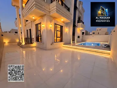 Villa for sale on Sheikh Mohammed Bin Zayed Road, located on a main street near the park. It features two floors and a rooftop terrace. Freehold owner
