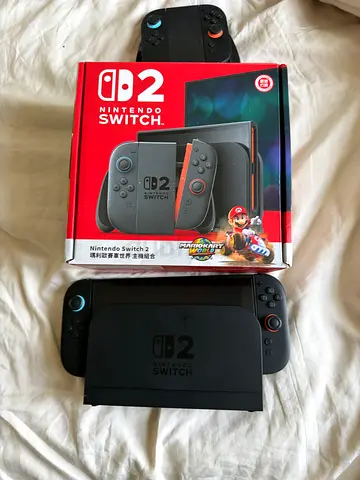 Nintendo Switch 2 (console + dock + extra Joy-Cons with one grip) - used