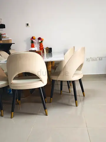 Marble-top Dining Table with 8 Beige Chairs - Good Condition