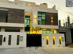 Luxury villa for sale in Al Helio 2 – Ajman, featuring a premium stone façade and modern design. 