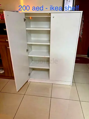 IKEA white storage cabinet with shelves - good condition