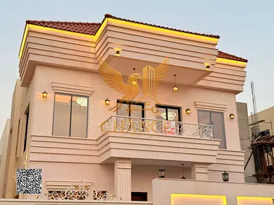Two-story (classic) villa with a roof for sale in Ajman Price includes registration fees and is negotiable.