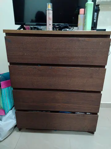 Dark wood 4-drawer chest of drawers - good condition