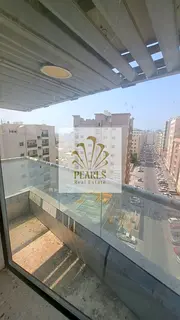 2 Bedroom Apartment for Rent in Al Nuaimiya Ajman Near Kuwait Street Balcony Pool Gym Parking Centra