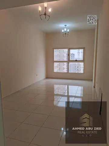 Beautiful 2-bedroom apartment for annual rent in Emirates City. 2 bathrooms, separate kitchen, parking, open view, family-friendly. 4 payments, cheque
