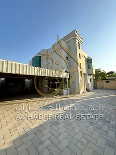 Al Jazzat, Sharjah | Independent Villa for Rent Covered parking for three cars.