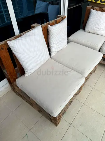 Wooden outdoor pellet with cushions