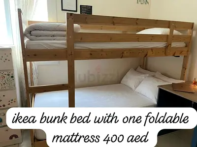 IKEA wooden bunk bed with foldable mattress - good condition