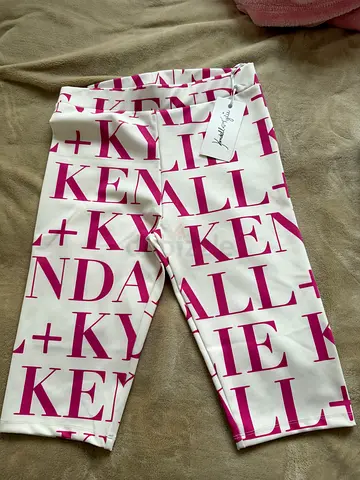 Kendall & Kylie White and Pink Logo Print Capri Leggings — never worn. Brand new