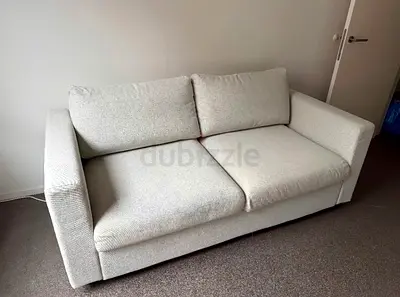 two-seater sofa bed in good condition
