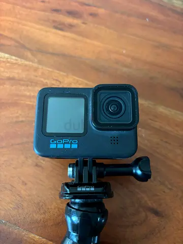 GoPro 11 HERO action camera with clip mount — 3 batteries and charging Hub