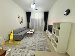 Luxury apartment (second occupancy), featuring a bedroom, a living room, and an open balcony. in Al