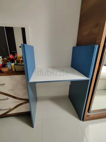 Compact single study desk with blue side panels - good condition
