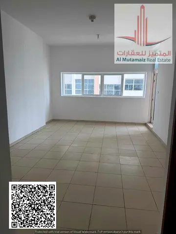 One-bedroom apartment with a living room for rent in Ajman One Towers. Includes two bathrooms, a ba