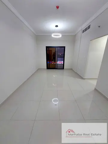 Brand New 2-bedroom hall apartment with balcony for rent in Al Rashidiya 1.