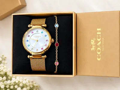 Coach gold-tone women's watch with matching bracelet - like new