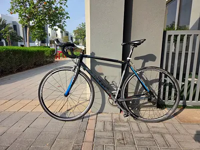 53cm road bike, Shimano Tiagra, carbon fork, Michelin Pro4 tyres