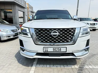 2015 Nissan Patrol LE Platinum GCC Specs FULL OPTION BLACK COLOR PUT STICKER WHITE VERY CLEAN CAR