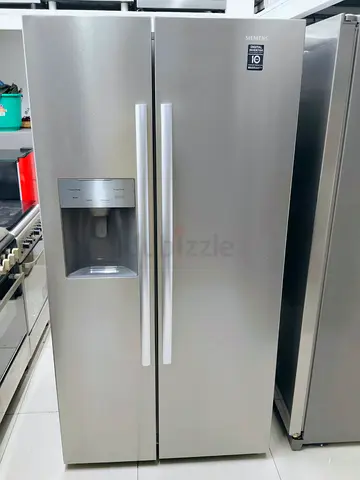 Siemens brand fridg with water dispenser like new condition