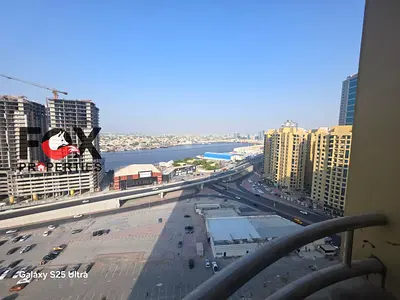 Two-bedroom apartment with a living room, three bathrooms, two balconies, and parking for sale in Horizon Towers.