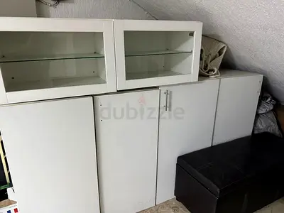 White modular storage cabinets with glass display top - set of 3