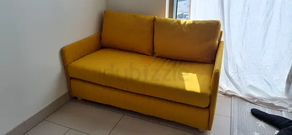 IKEA FRIDHULT Compact 2-seater sofa bed mustard yellow