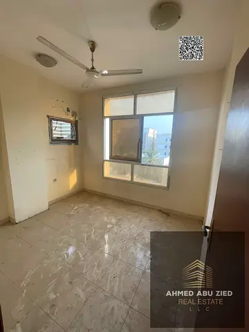 Beautiful 2-bedroom apartment for annual rent in Al Nuaimiya. Ideal for workers and employees, balcony, 4 payments, cheque deposit, prime location