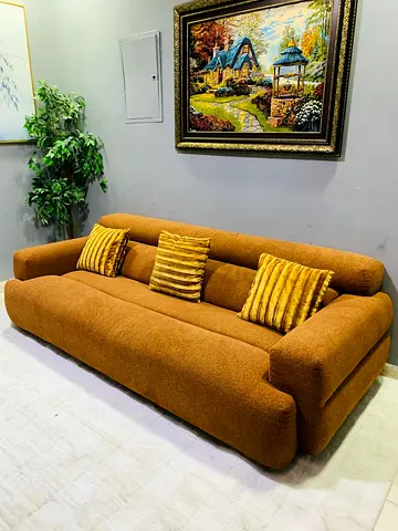 Modern mustard-brown 3-seater sofa in good condition