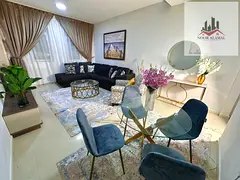 Sharjah, Al Majaz 3: Apartment featuring two rooms, a living room, a kitchen, two bathrooms, and a b