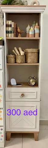 Slim freestanding wooden cabinet with shelves and drawer - Light cream finish - 300 AED