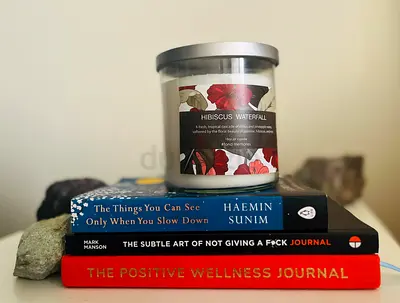 Self-Care Books & A Candle on Top