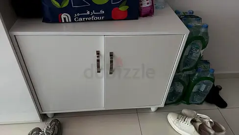 White two-door shoes storage cabinet - compact, good condition