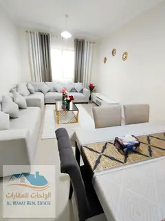 For monthly rent: a one-bedroom apartment with a living room and two bathrooms in Al Nuaimiya 1, nea
