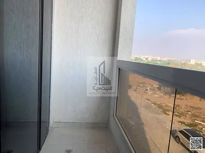 Distinctive 2-Bedroom Apartment with Living Room for Rent in Muwaileh 2