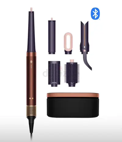 Corded multi-head hair styler with brush attachments